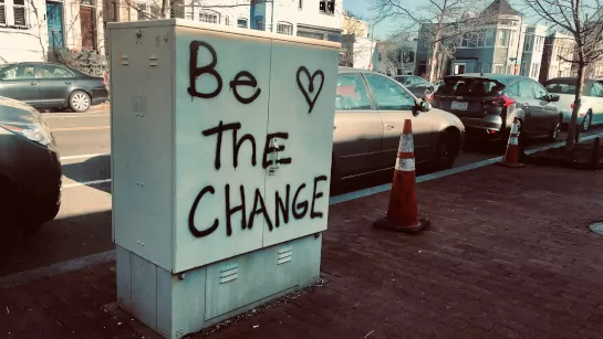 “Be The Change” written on a junction box